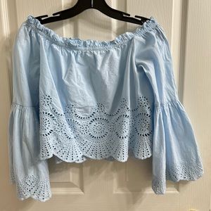super cute blue off the shoulder top with detailing at the bottom